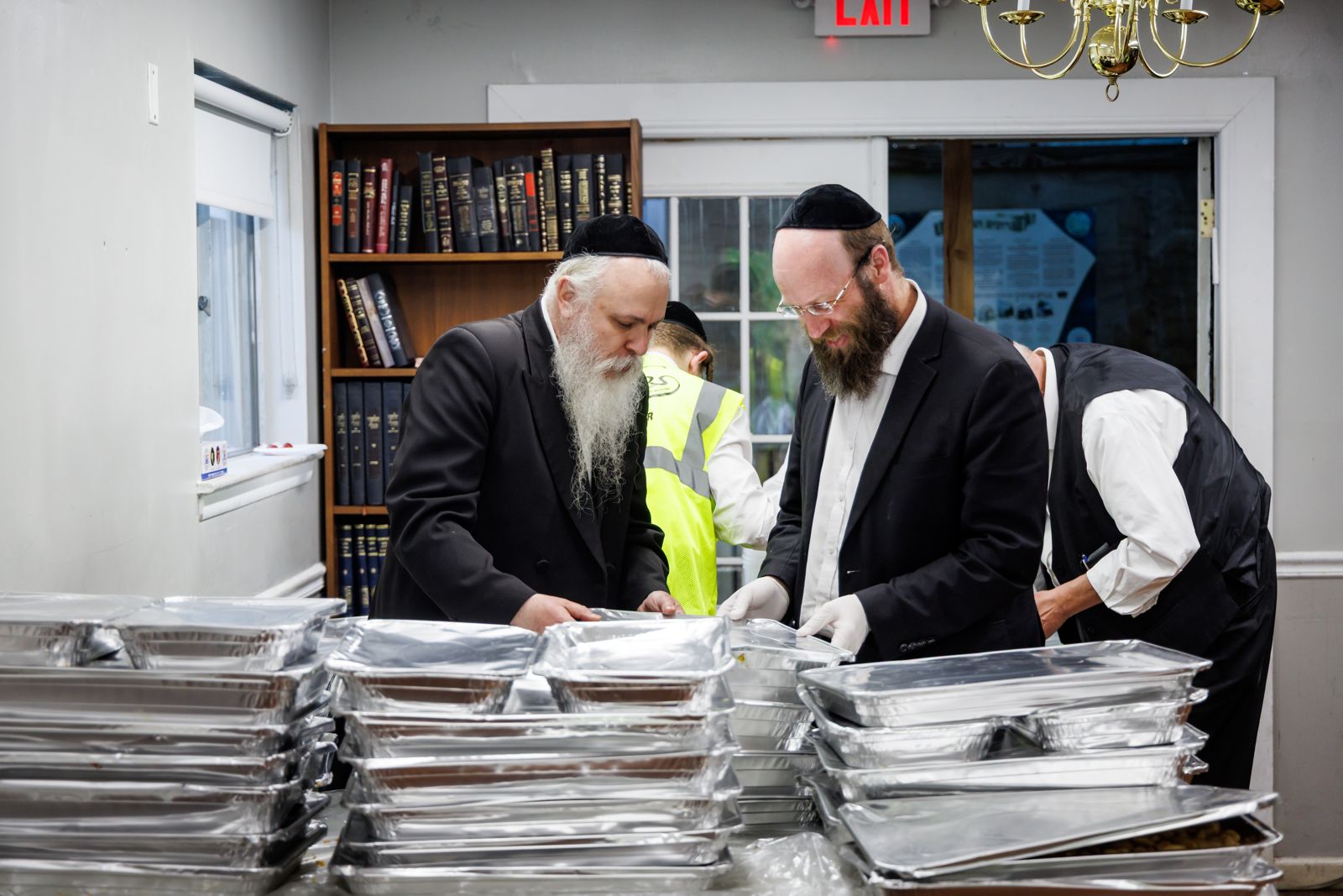 Rabbi Sholom Rokeach and volunteers today